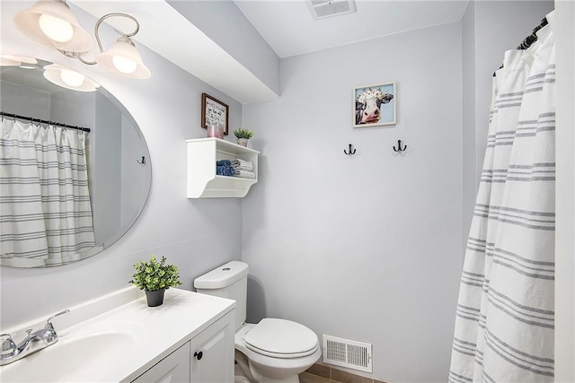 bathroom with visible vents, curtained shower, toilet, and vanity