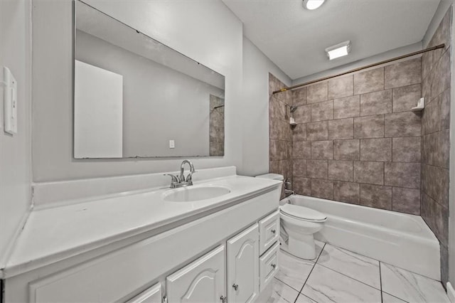 full bath featuring vanity, a textured ceiling, bathing tub / shower combination, toilet, and marble finish floor