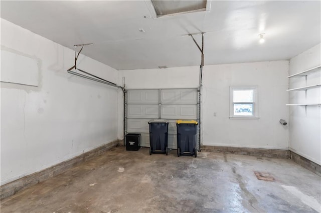 garage featuring baseboards