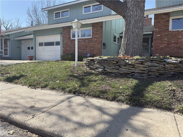 view of side of home with brick siding