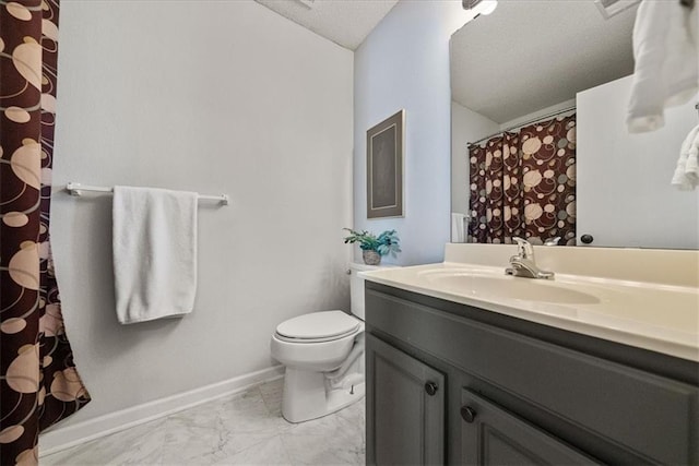 full bathroom with vanity, baseboards, a textured ceiling, toilet, and marble finish floor