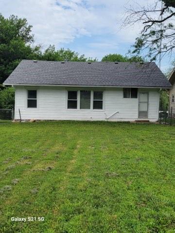 1727 S Crescent Ave, Independence, MO 64052 - rear view of property featuring a shingled roof