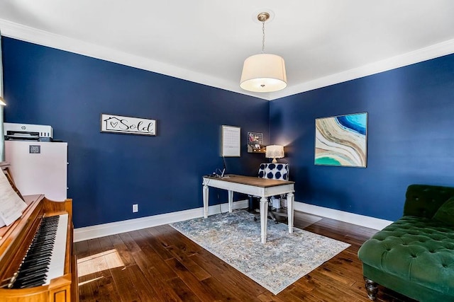 office area featuring visible vents, baseboards, and hardwood / wood-style flooring