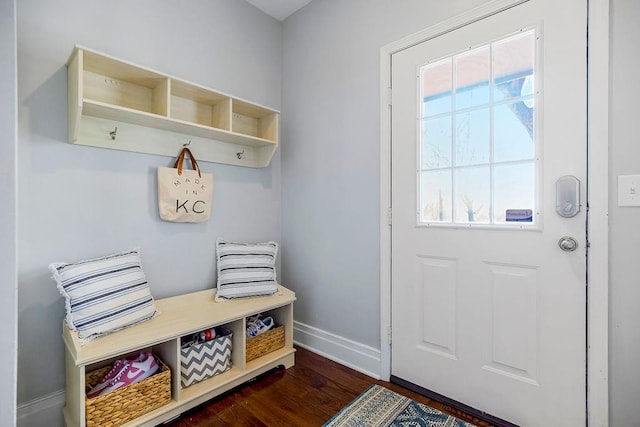 mudroom with a healthy amount of sunlight, baseboards, and dark wood-style flooring