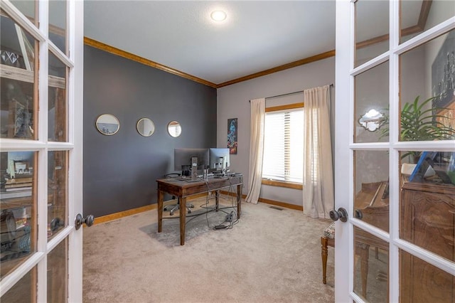 carpeted office featuring french doors, baseboards, and crown molding