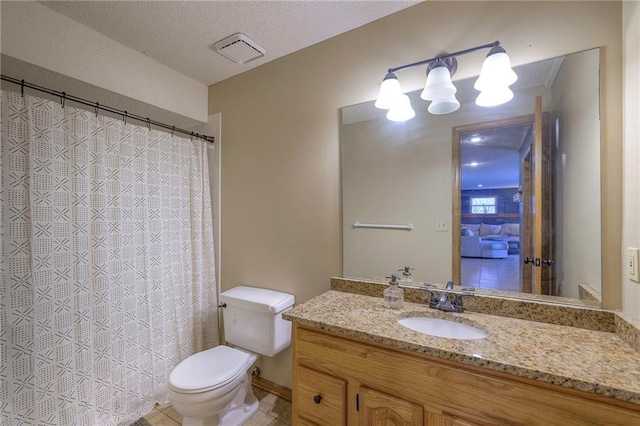 bathroom with visible vents, toilet, a textured ceiling, a shower with shower curtain, and vanity