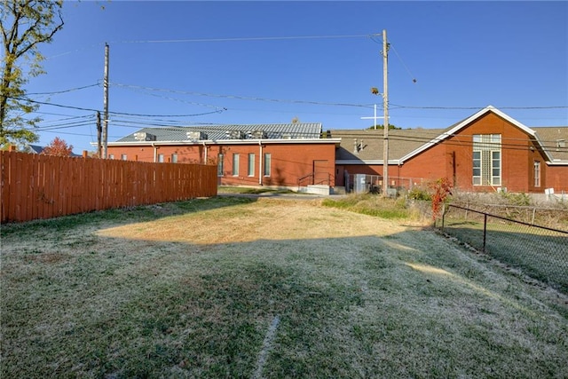 view of yard featuring fence private yard