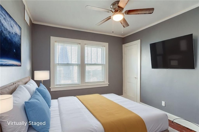 2850 Mersington Ave, Kansas City, MO 64128 - bedroom featuring crown molding and ceiling fan