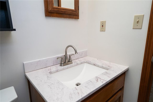 half bath with toilet and vanity