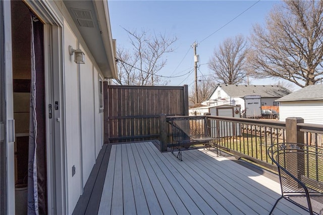 deck featuring an outdoor structure