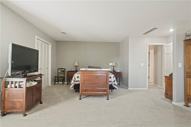 interior space with recessed lighting, baseboards, visible vents, and light colored carpet