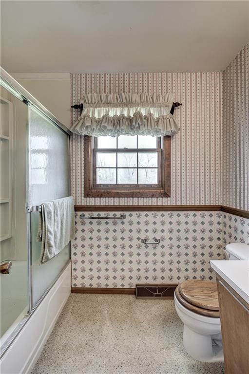 bathroom featuring vanity, speckled floor, visible vents, wallpapered walls, and toilet