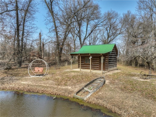 exterior space with an outbuilding