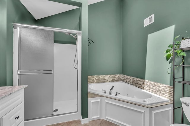 full bathroom featuring visible vents, a shower stall, and a jetted tub