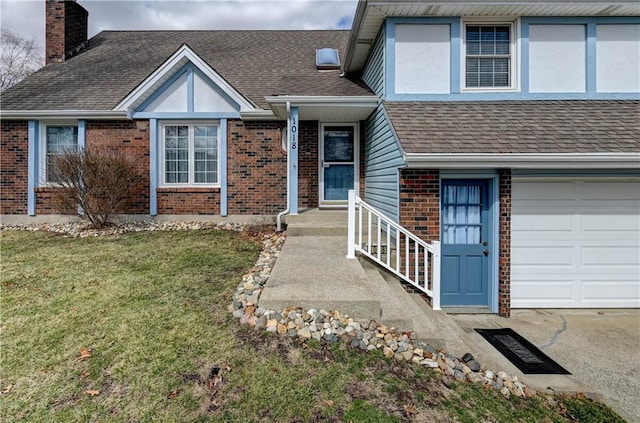 property entrance featuring brick siding, a shingled roof, a lawn, a chimney, and a garage