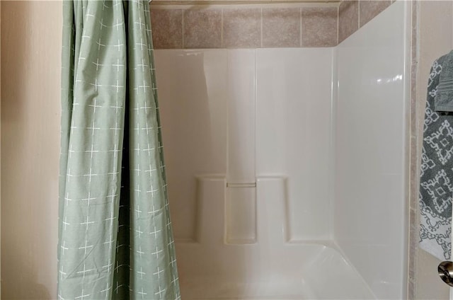 bathroom with curtained shower