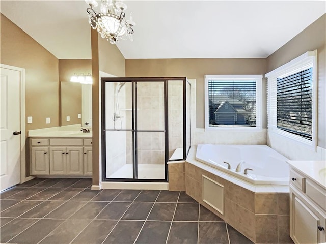 bathroom with a bath, tile patterned flooring, a shower stall, and lofted ceiling