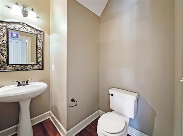 2300 Silver Spring Ln, Lees Summit, MO 64086 - bathroom with wood finished floors and lofted ceiling