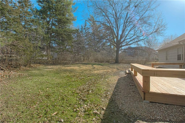 view of yard featuring a wooden deck