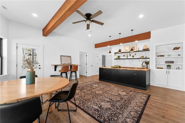 dining space with visible vents, ceiling fan, beam ceiling, recessed lighting, and wood finished floors