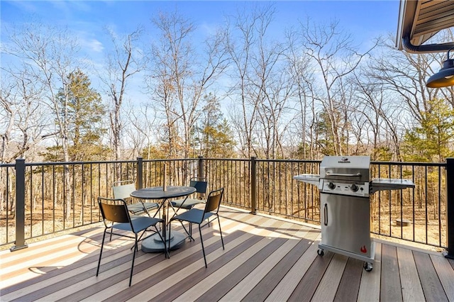 wooden terrace with area for grilling