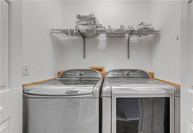 laundry room with laundry area and washing machine and dryer