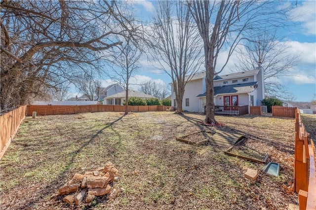 view of yard with a fenced backyard