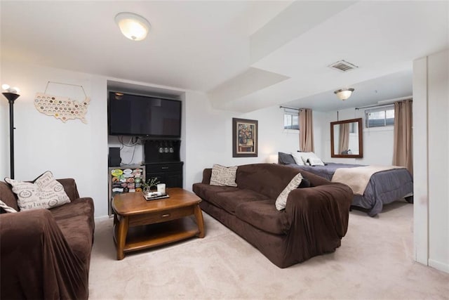 carpeted living room with visible vents