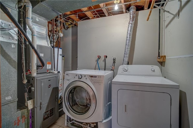 laundry room with independent washer and dryer and laundry area