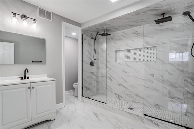 full bathroom with vanity, visible vents, a marble finish shower, baseboards, and marble finish floor