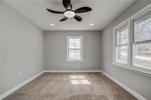 carpeted empty room featuring recessed lighting, baseboards, and ceiling fan