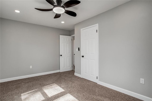 unfurnished bedroom with recessed lighting, baseboards, a ceiling fan, and carpet flooring