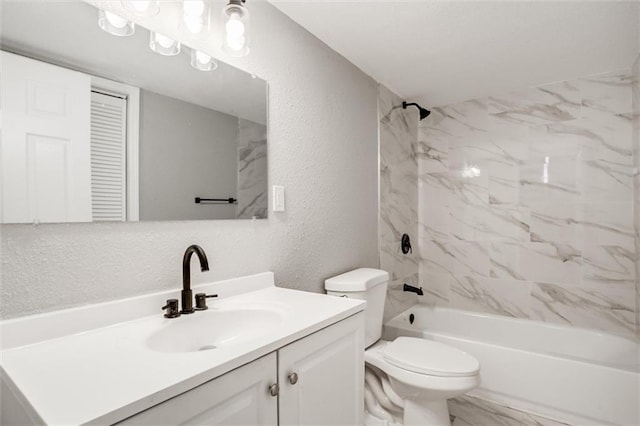 full bathroom featuring vanity, tub / shower combination, toilet, a textured wall, and marble finish floor