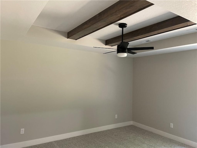2101 N 31st Ter, Saint Joseph, MO 64506 - spare room with ceiling fan, light colored carpet, and beam ceiling