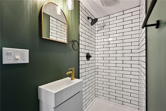 full bath featuring visible vents, a shower stall, and vanity