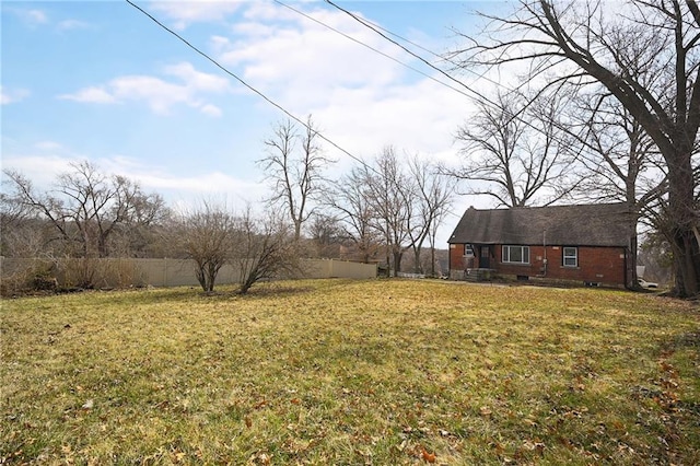 view of yard with fence