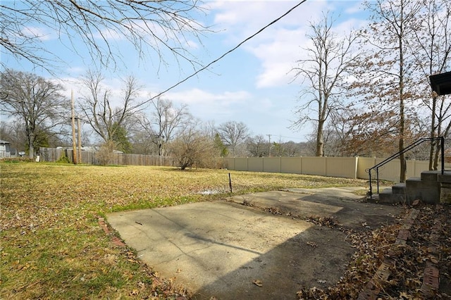 view of yard with a patio and fence