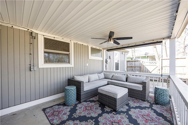 view of patio / terrace with a ceiling fan, fence, and an outdoor hangout area