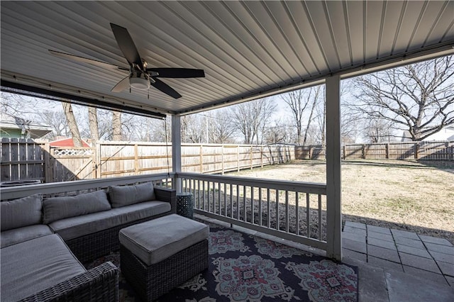 view of patio / terrace featuring a fenced backyard, ceiling fan, and outdoor lounge area