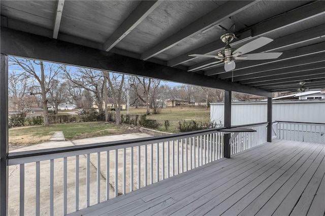 wooden deck with a ceiling fan