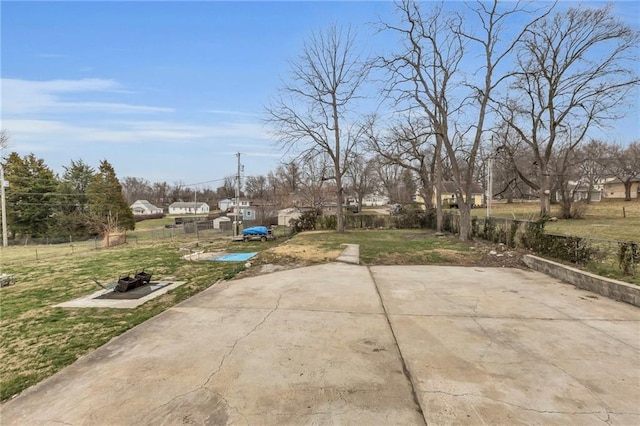 view of yard with a patio and fence