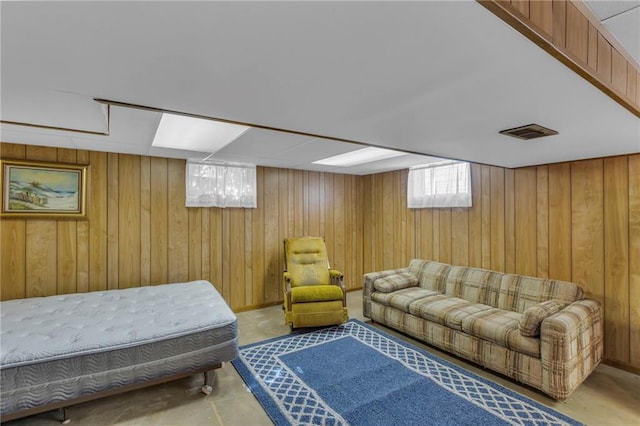 living room featuring wooden walls