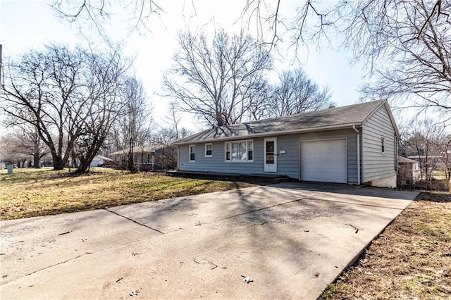 single story home with an attached garage and concrete driveway