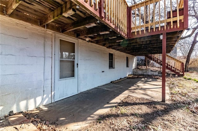 view of patio featuring stairway