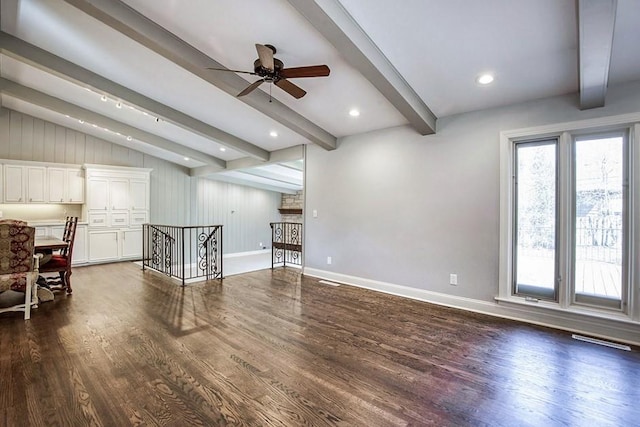 living room featuring baseboards, lofted ceiling with beams, recessed lighting, a ceiling fan, and dark wood-style flooring