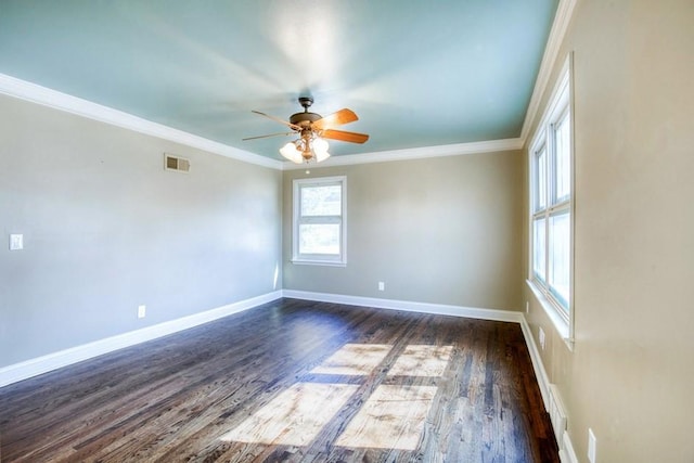 unfurnished room featuring visible vents, baseboards, ornamental molding, a ceiling fan, and dark wood-style flooring