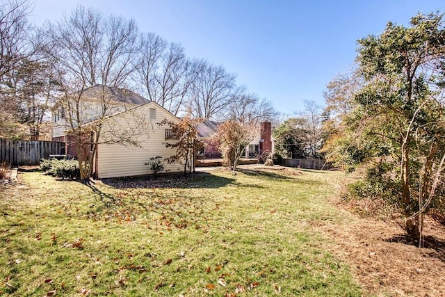 view of yard featuring fence