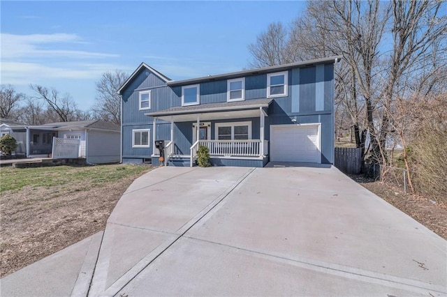 view of front of home with a porch, an attached garage, driveway, and fence