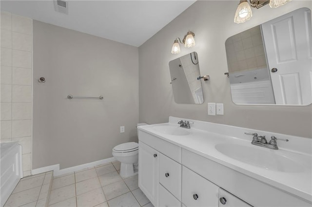 full bath with a tub to relax in, visible vents, and a sink