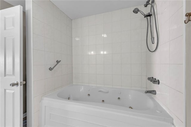 bathroom featuring a combined bath / shower with jetted tub